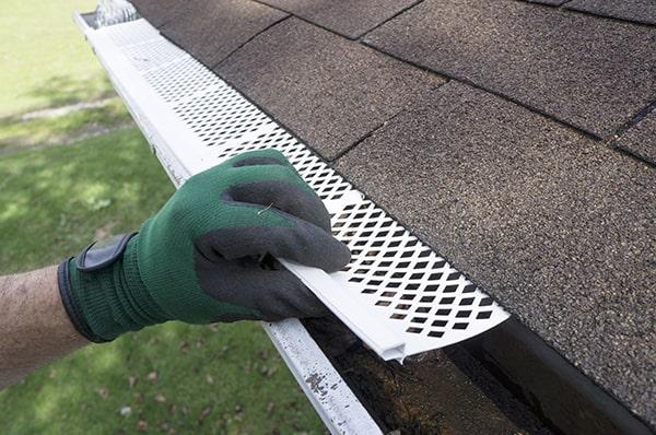 there are various types of gutter guards, including mesh, bottle brush, and reverse curve gutter guards